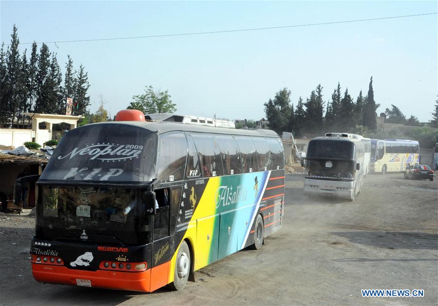 SYRIA-WAFIDEEN-REBELS-FAMILIES-EVACUATION