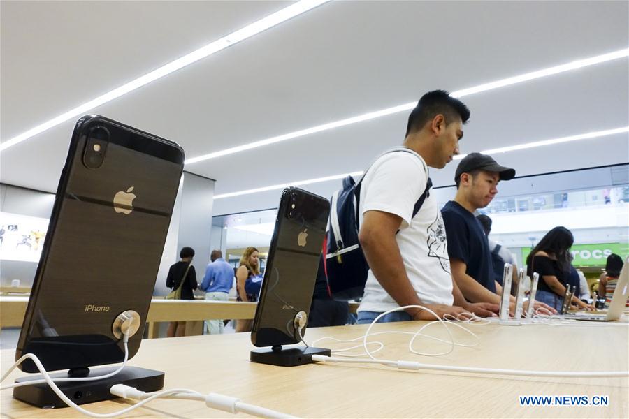 U.S.-NEW YORK-APPLE-SHARES-ONE TRILLION USD