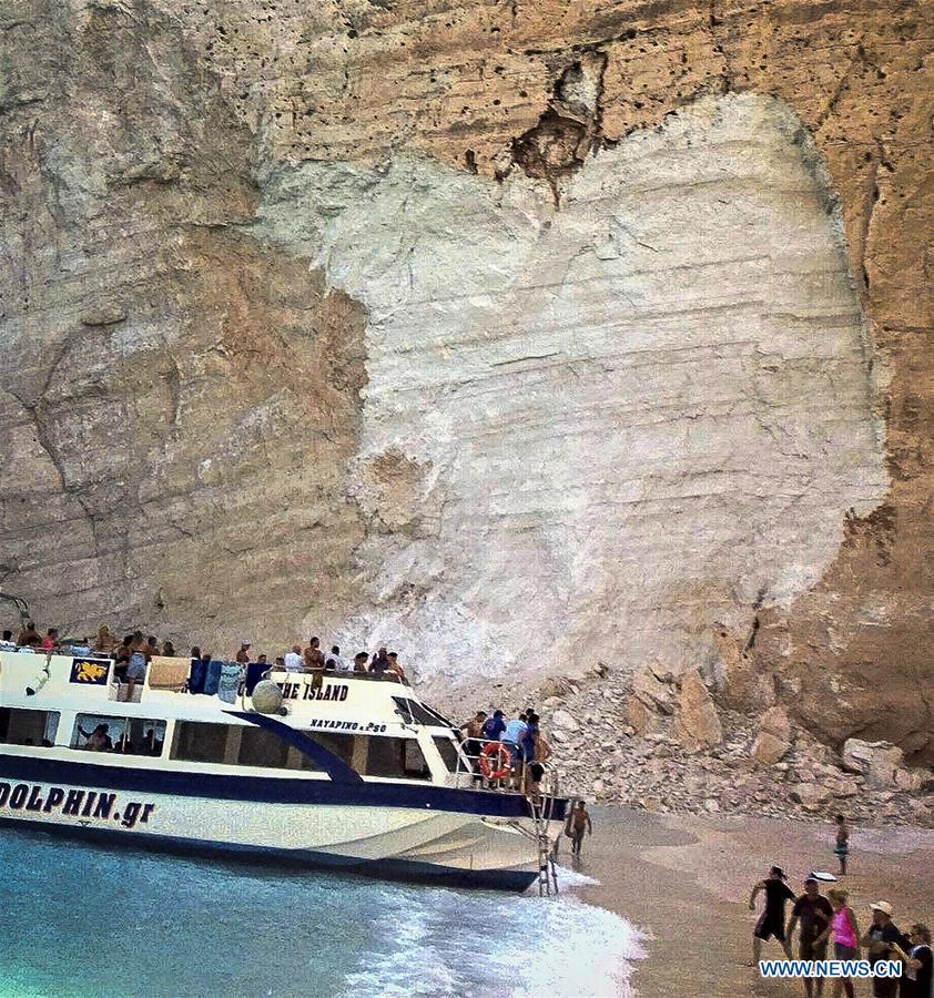 GREECE-ZAKYNTHOS-NAVAGIO BEACH-ROCK SLIDE