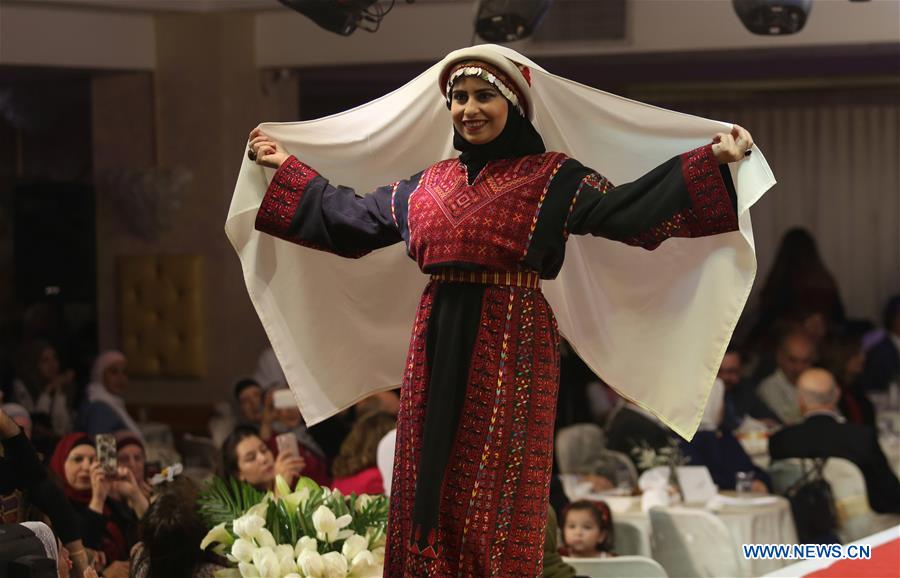 MIDEAST-NABLUS-FASHION SHOW-HERITAGE DRESS