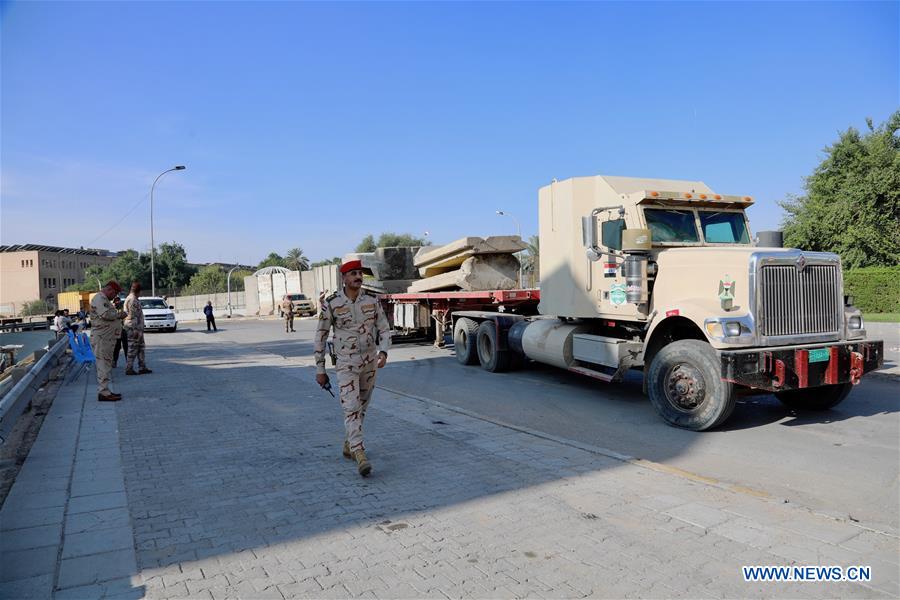 IRAQ-BAGHDAD-GREEN ZONE-CONCRETE WALLS-REMOVING