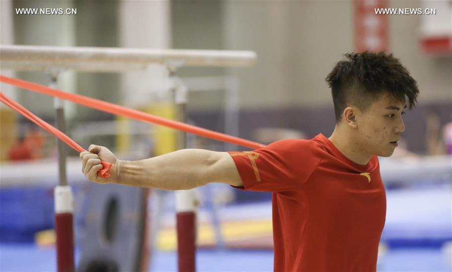 (SP)CHINA-BEIJING-ARTISTIC GYMNASTICS-TRAINING