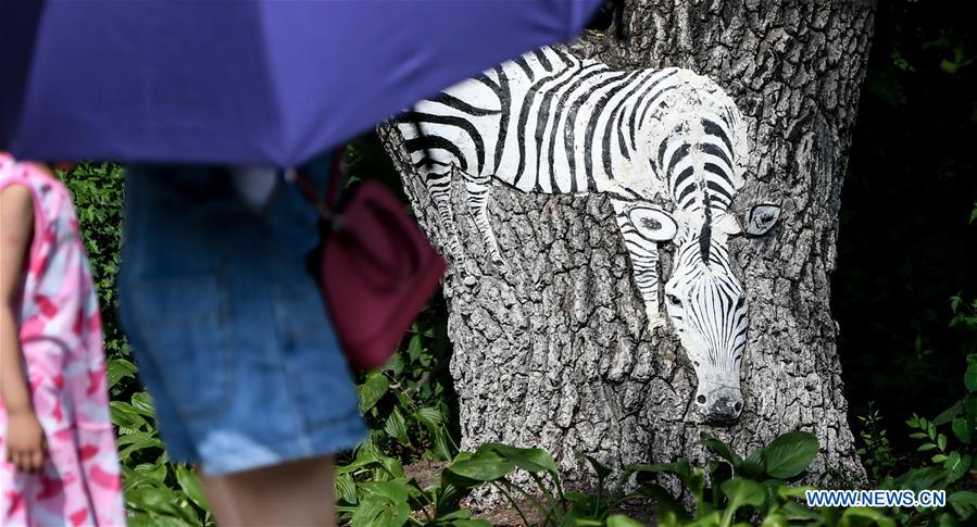 CHINA-JILIN-CHANGCHUN-TREE BARK CARVING AND PAINTING (CN)