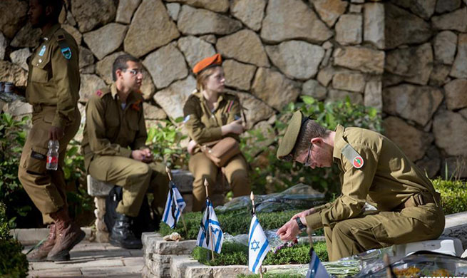 People mark Memorial Day to commemorate Israel's fallen soldiers and victims