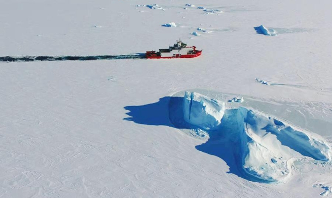 China's polar icebreaker Xuelong 2 breaks ice in waters in Antarctica