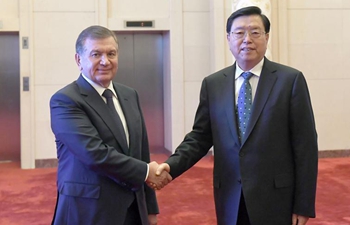 Zhang Dejiang meets Uzbek President Shavkat Mirziyoyev in Beijing