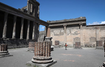 People visit Archaeological Park of Pompeii in Italy