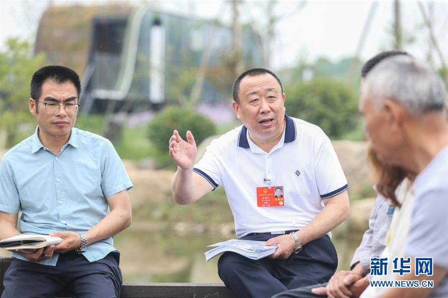 （新華全媒頭條·兩會精神看落實·圖文互動）（2）整體謀劃、系統(tǒng)升級、全面提升——落實全國兩會精神織牢織密公共衛(wèi)生防護網