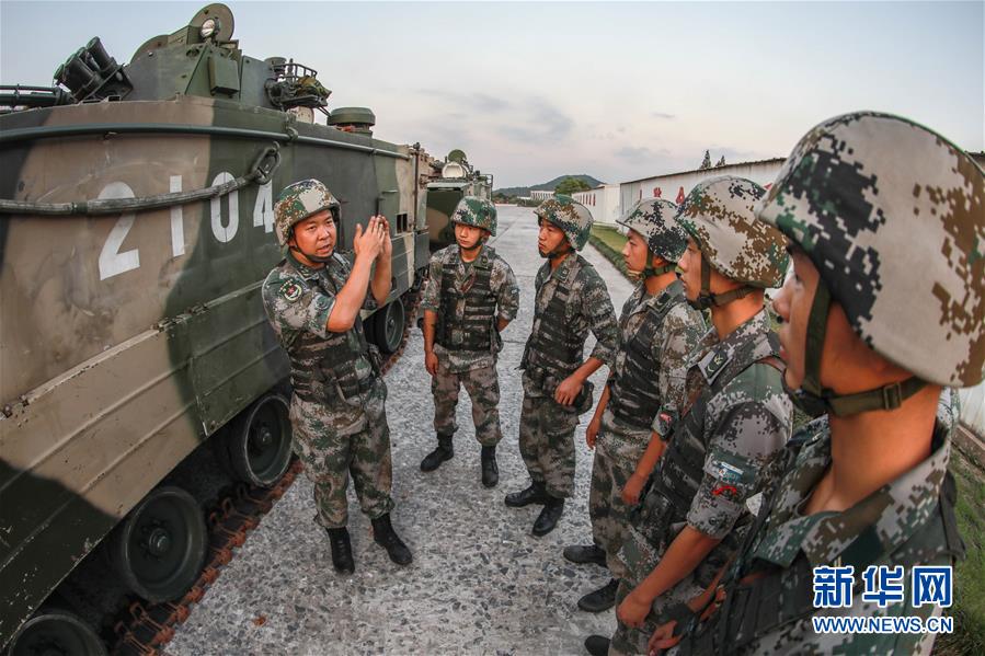 （圖文互動）（2）新時代的“勝戰先鋒”——第72集團軍某旅兩棲裝甲技師譚斌生死沖鋒盡顯勝戰本色