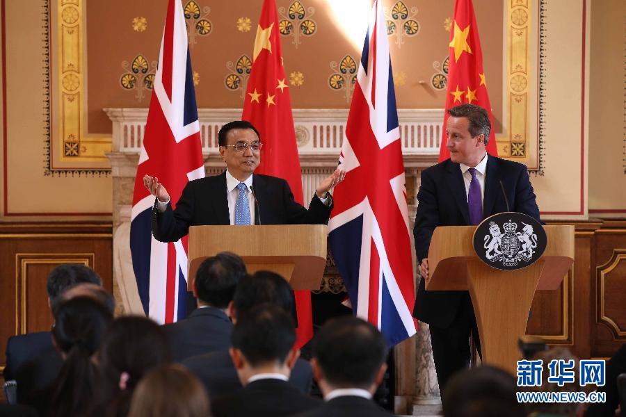 6月17日，國務院總理李克強同英國首相卡梅倫在倫敦舉行中英總理年度會晤后共同會見記者。新華社記者 龐興雷 攝